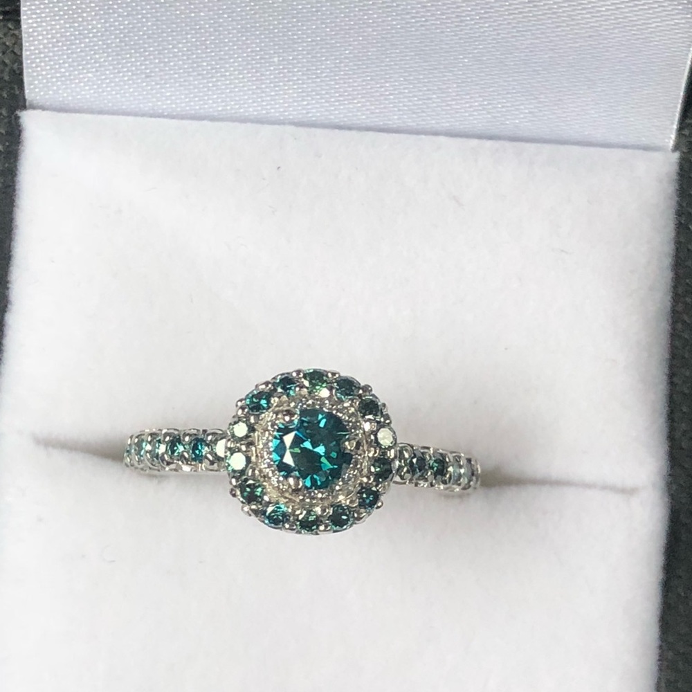 Lady’s palladium and blue diamond ring